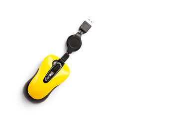 Yellow computer mouse isolated on white background.
