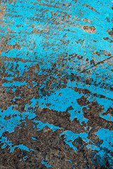 Fresh closeup turquoise color street texture, cropped only details showing rough painted and accidental patterns created by car wheels and weathers.