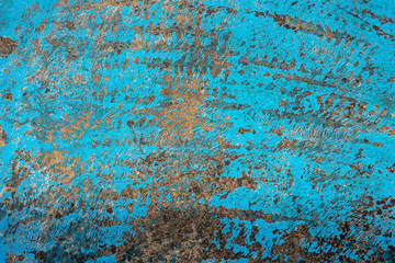 Fresh closeup turquoise color street texture, cropped only details showing rough painted and accidental patterns created by car wheels and weathers.