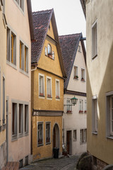ROTHENBURG OB DER TAUBER, GERMANY -  MARCH 05, 2018: Historic colorful half-timbered houses in the medieval town Rothenburg ob der Tauber, one of the most beautiful villages in Europe, Germany