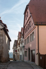 ROTHENBURG OB DER TAUBER, GERMANY -  MARCH 05, 2018: Historic colorful half-timbered houses in the medieval town Rothenburg ob der Tauber, one of the most beautiful villages in Europe, Germany