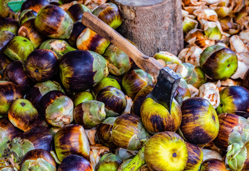 Fruit of sugar palm and the ax