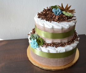 Nappy cake made from nappies, ribbons and flower seemed decorations