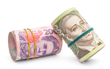 Rolled up 200 and 500 hryvnia bills on white background.
