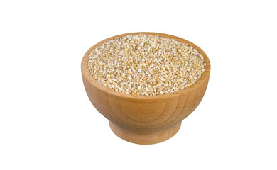 fine ground barley in wooden bowl isolated on white background. nutrition. food ingredient.