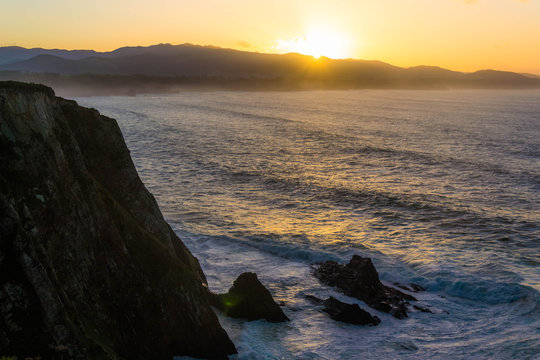 Sunset at Busto Lighthouse, Asturias, Spain