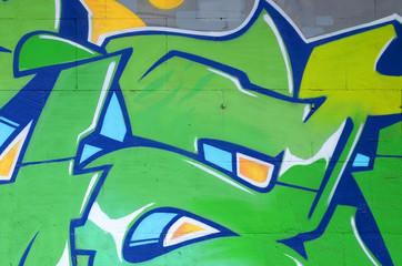 Fragment of colored street art graffiti paintings with contours and shading close up