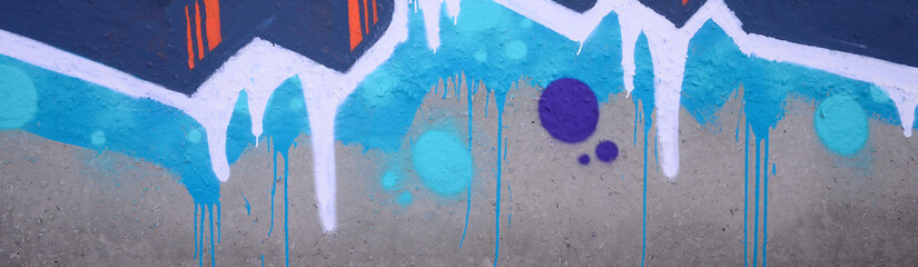 Fragment of colored street art graffiti paintings with contours and shading close up