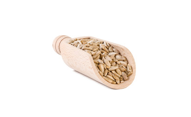 sunflower seed in wooden scoop isolated on white background. nutrition. bio. natural food...
