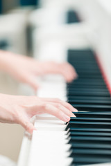 Fototapeta premium Playing piano