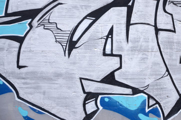 Fragment of colored street art graffiti paintings with contours and shading close up