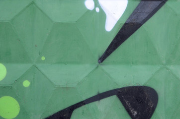 Fragment of colored street art graffiti paintings with contours and shading close up