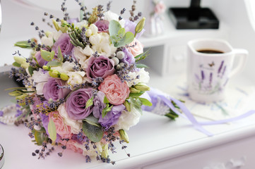 wedding bouquet of roses on a white table