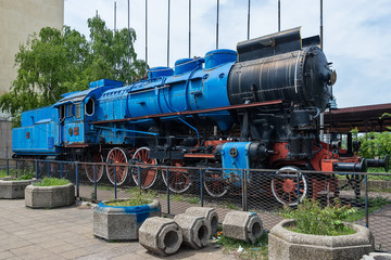 Fototapeta na wymiar Belgrade, Serbia April 26, 2019: Locomotive of Blue train, Museum Exhibit. This famous locomotive was used for the famous Blue Train belonging to Josip Broz Tito.