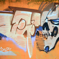 Fragment of colored street art graffiti paintings with contours and shading close up