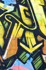 Fragment of colored street art graffiti paintings with contours and shading close up