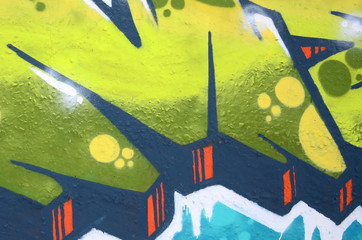 Fragment of colored street art graffiti paintings with contours and shading close up