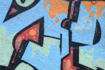 Fragment of colored street art graffiti paintings with contours and shading close up