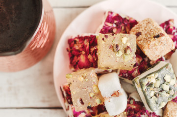 Assorted Lebanese sweets and coffee. Turkish delights and nougat