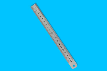 Single metal straightedge with digits and scale in center on blue background