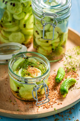 Closeup of natural and healthy canned cucumber in the jar