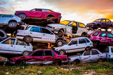 Pile of discarded old cars on junkyard - obrazy, fototapety, plakaty
