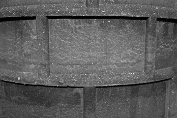 A fragment of the ring of the inspection sewer manhole made of polymer sand mixture.