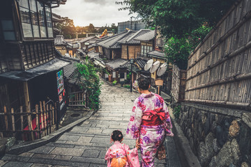 Kyoto, Japan Culture Travel - Asian traveler wearing traditional Japanese kimono walking in...