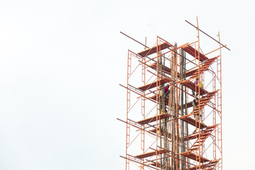 scaffolding with worker isolated from sky