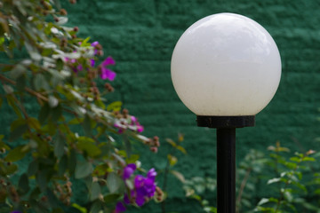 round luminaire in the garden