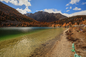 Yala Snow Mountain Glacial Lake, Clear Water. Tibet area of Sichuan Province China, Valley covered...