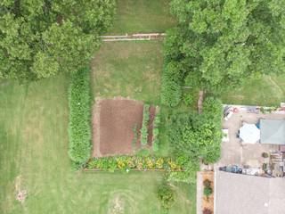 Aerial view of a suburban yard and garden in spring