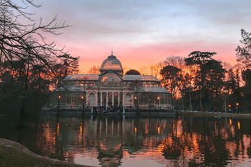 Obraz premium Crystal Palace (Palacio de cristal) in the Retiro Park in Madrid. Spain. It was built in 1887 to exhibit flora and fauna from the Philippines. The architect was Ricardo Velazquez Bosco.