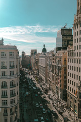 Panorama top view of Gran Via, main shopping street in Madrid from roof top bar, capital of Spain, Europe. 