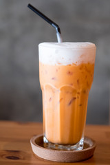 A glass of ice milk tea, fresh and sweet dessert