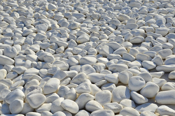 Fototapeta na wymiar White stones pebbles for decoration