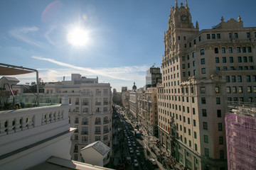 Panorama top view of Gran Via, main shopping street in Madrid from roof top bar, capital of Spain, Europe. 