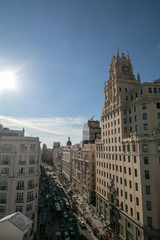 Panorama top view of Gran Via, main shopping street in Madrid from roof top bar, capital of Spain, Europe. 