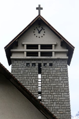Obraz premium Clocher de l'église Notre-Dame des Alpes. Le Fayet. / Bell tower of the Notre-Dame des Alpes church. The Fayet.