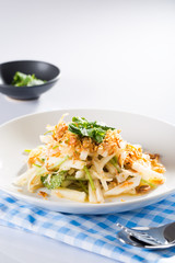 bamboo shoot  with pesto sauce and basil