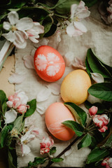 Obraz na płótnie Canvas Easter eggs, floral background, tinted