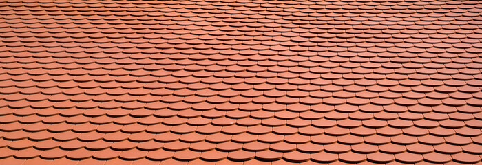 Roof tiles red color photographed in the distance