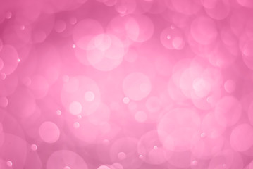 abstract bokeh light effect with soft pink background