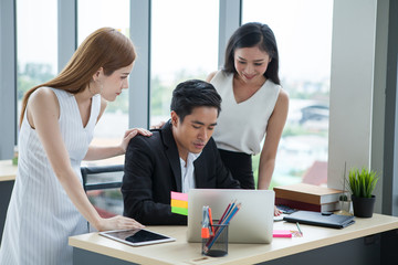 Businesswoman gestures and consolation Businessman in the office.  team work  girl employee patting...