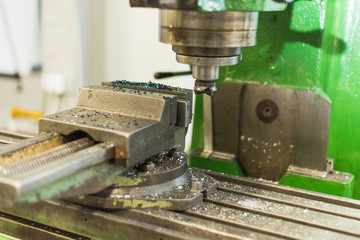 Work space in the factory. Vice, wrench, machine tool