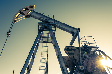 Oil pumpjack, industrial equipment. Rocking machines for power generation. Extraction of oil.