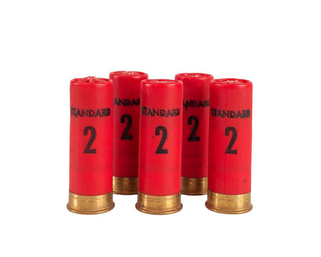 Red shotgun shells isolated on white.