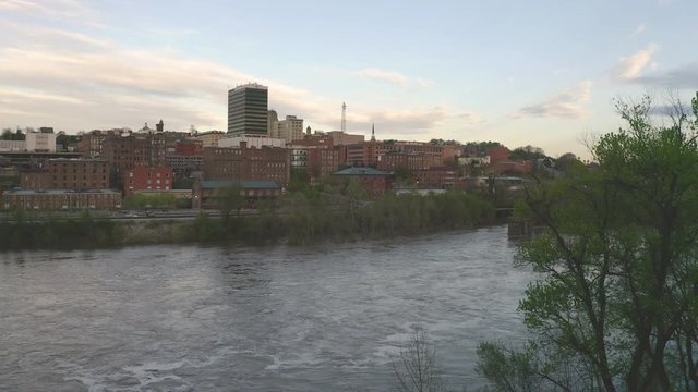 The James River Flows Quietly by Downtown City Skyline and Buildings of Lynchburg Virginia