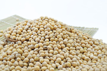 Closeup of soy beans on white background, selective focus (detailed close-up shot) 