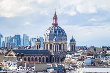 Fototapeta na wymiar Close up of the Saint Augustin church with Paris skyline in France